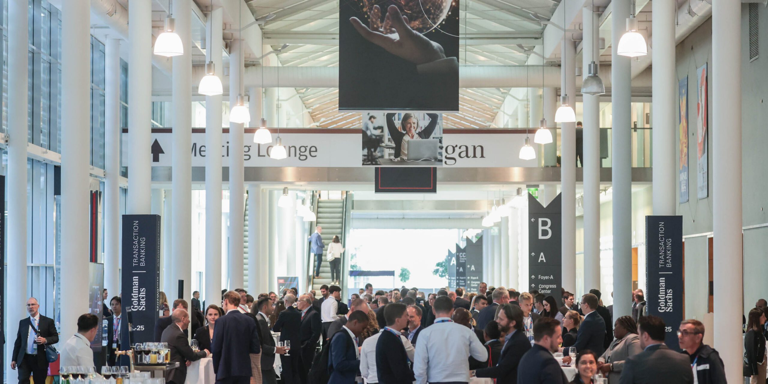 Delegates enjoying cocktails and canapes during the evening networking reception at EuroFinance 2026 in Barcelona.