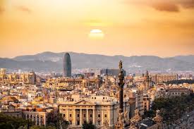 Panoramic sunset view of the Barcelona skyline, the host city for EuroFinance International Treasury Management 2026.