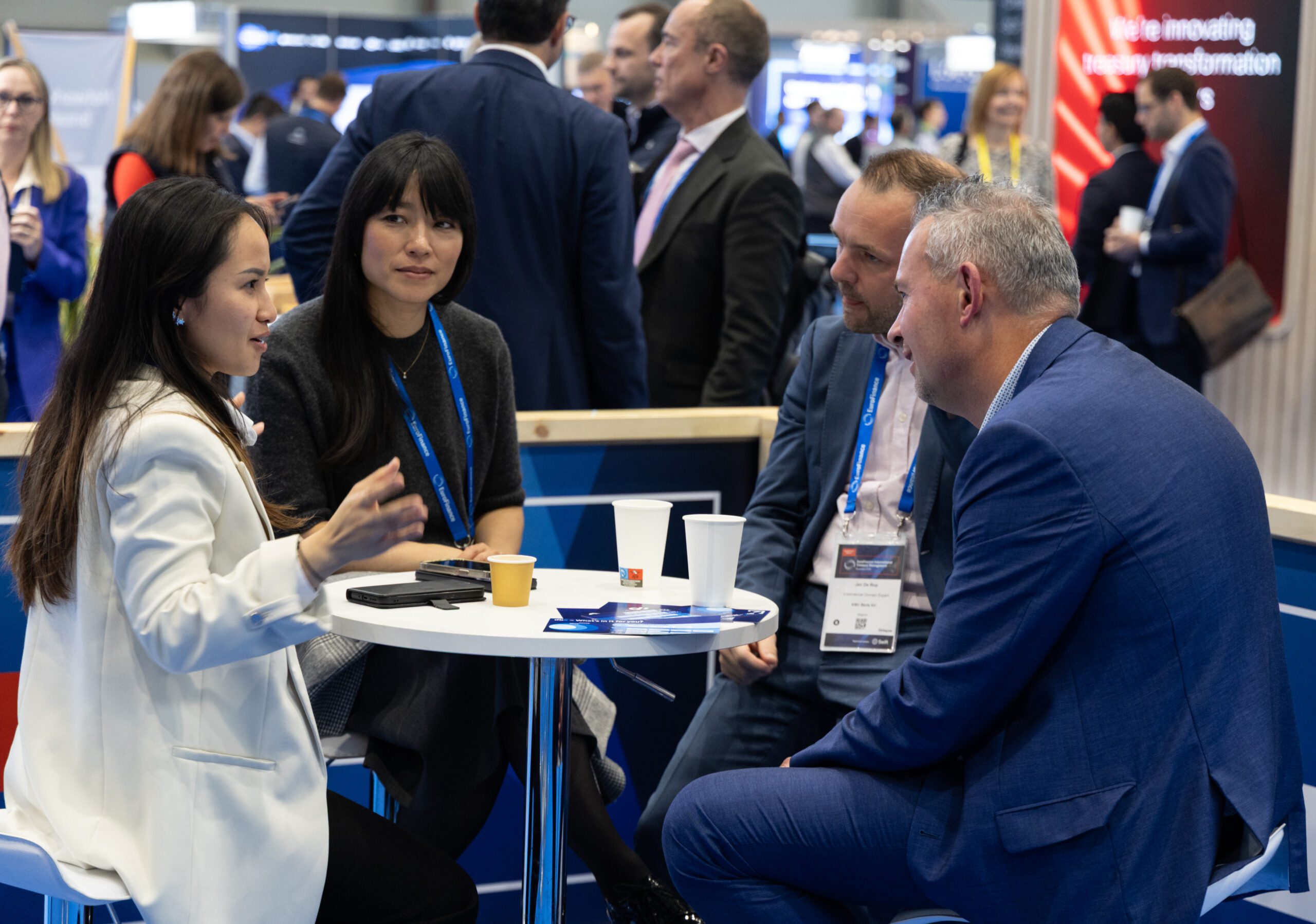 Senior treasury professionals engaging in a focused 1:1 meeting at EuroFinance 2026 in Barcelona.